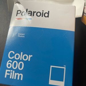 New polaroid camera with film . New